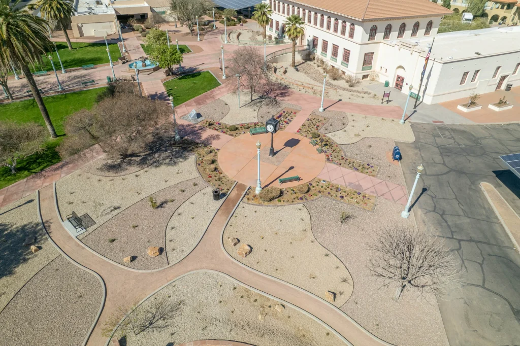 Aerial view of landscaped civic plaza with clock