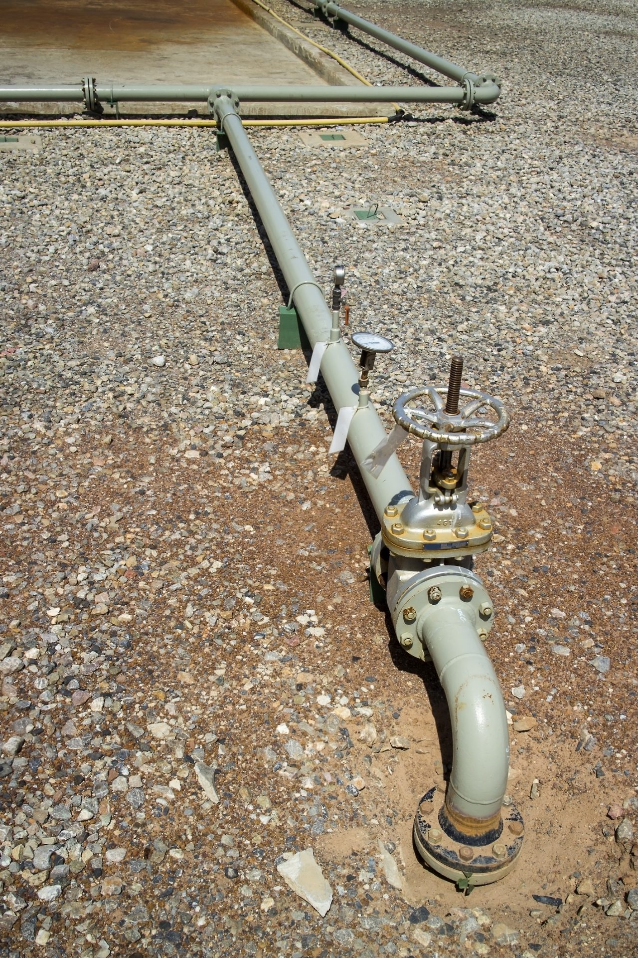 Industrial pipeline valve with pressure gauge on gravel